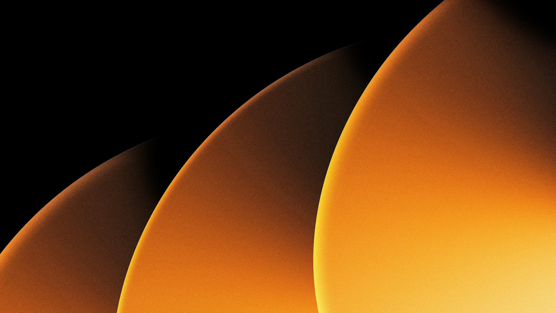 Abstract orange and black gradients form an artistic design.