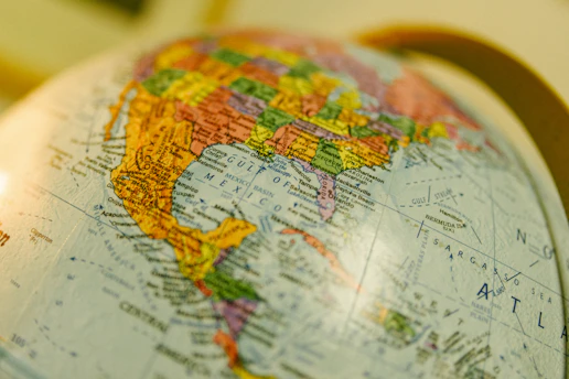 A colorful globe depicts north america.