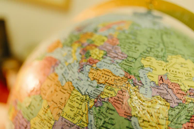 A globe showing political boundaries of countries.
