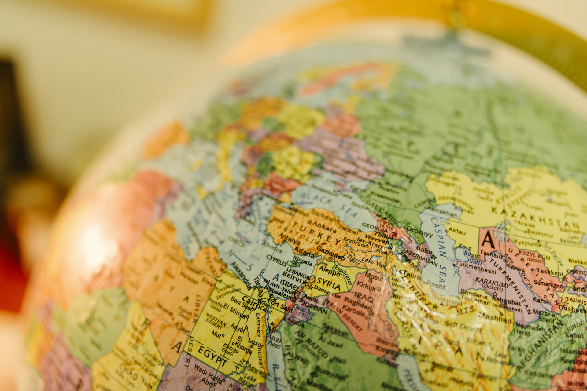 A globe showing political boundaries of countries.