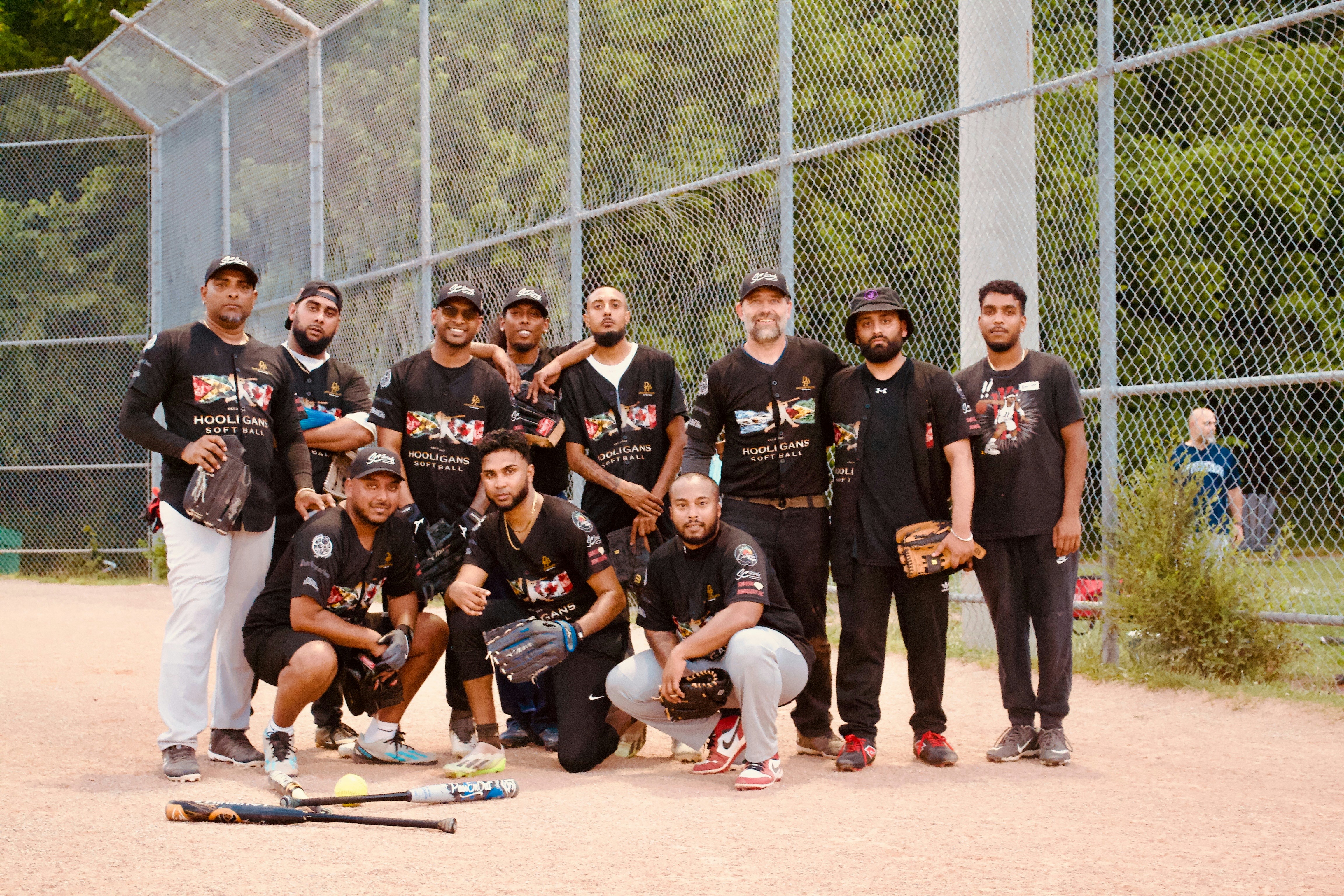 A baseball team poses for a photo together.
