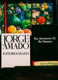 Books by jorge amado and colorful decorations.