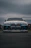 A blue BMW m3 looks powerful and ready.