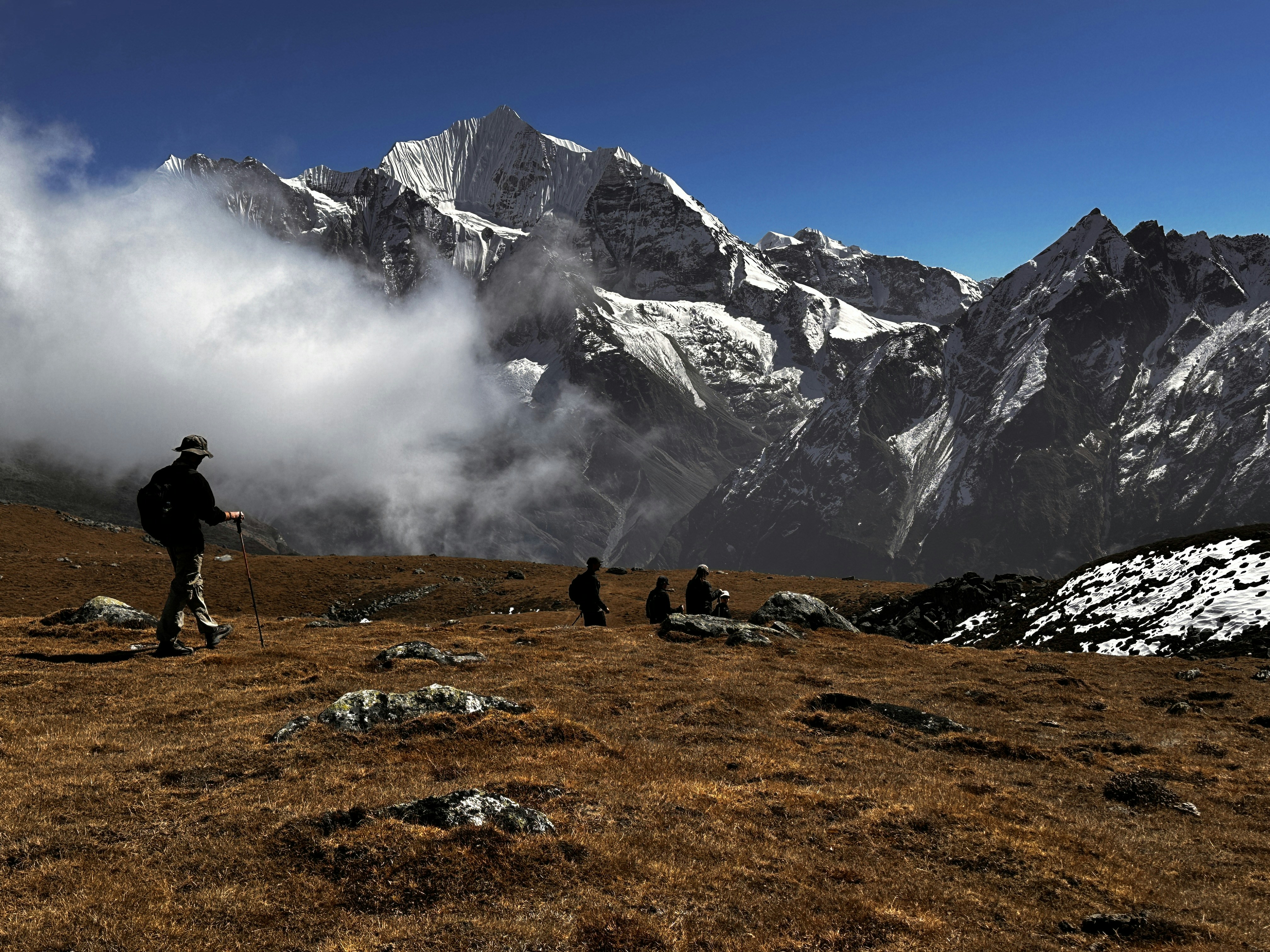 Hikers enjoy the scenic mountain views.