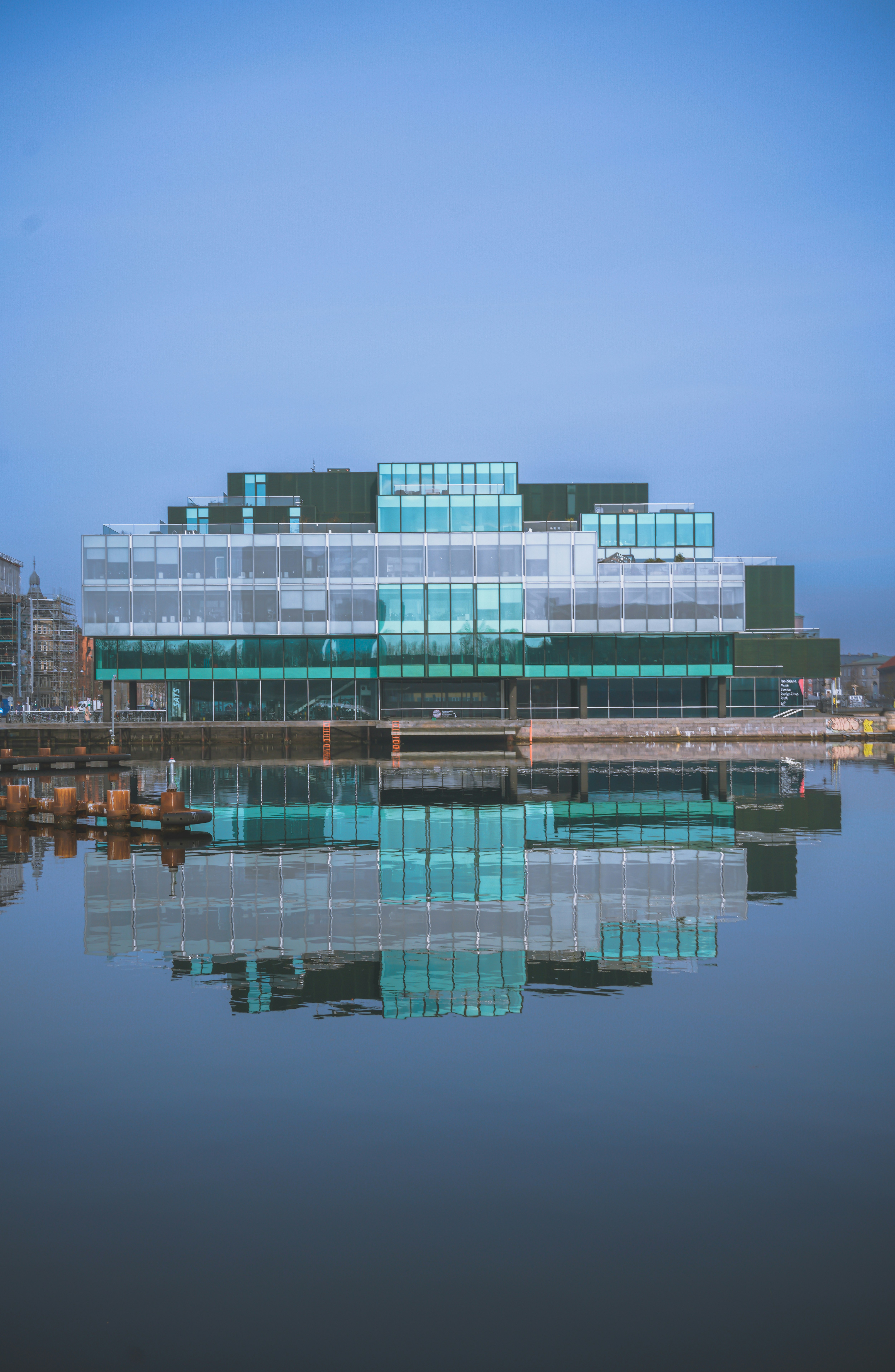 Modern building with a perfect water reflection.