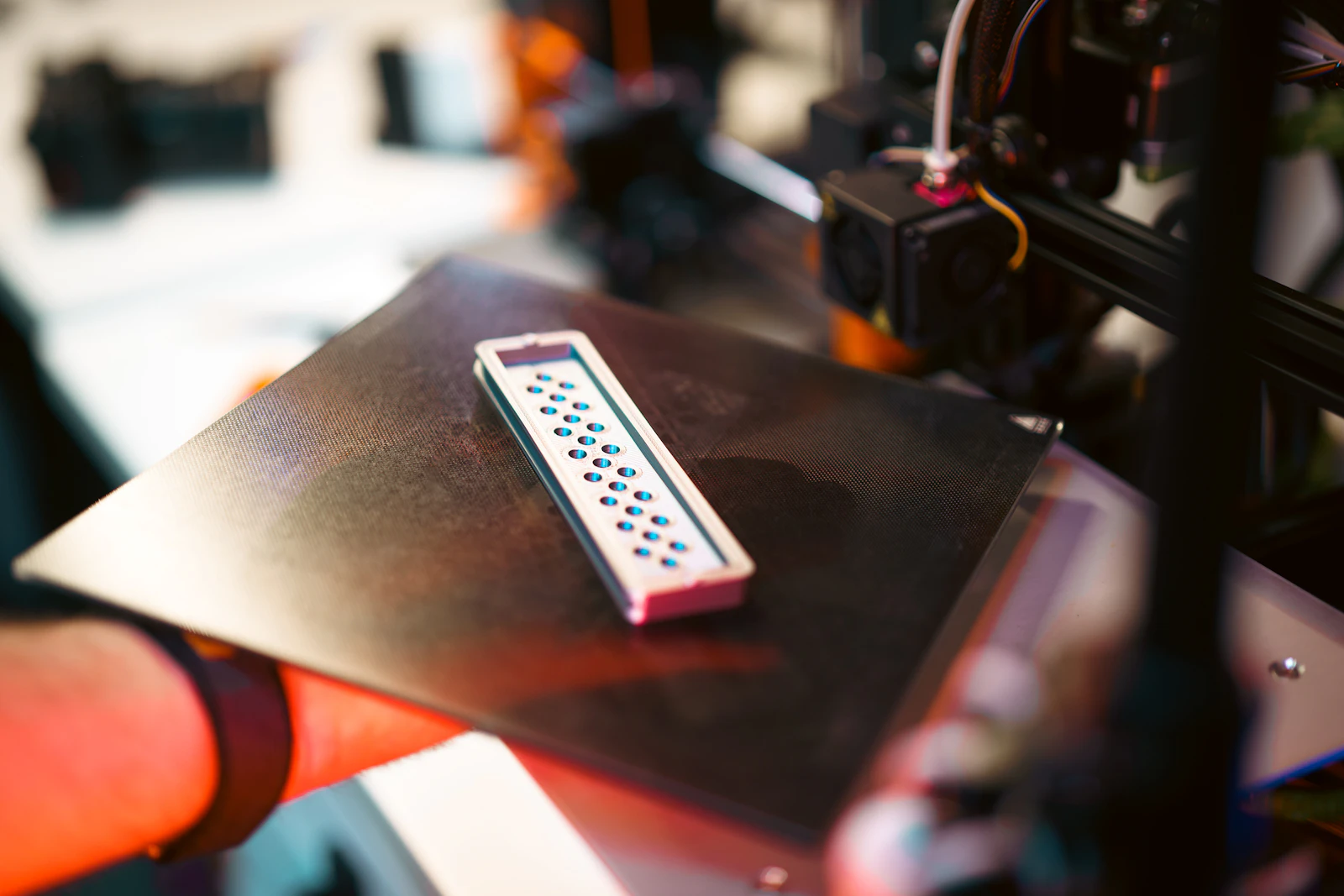 3D printed test object sitting on a printer bed