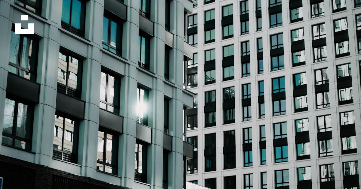 Modern buildings with many windows and a sunny highlight. photo – Free ...