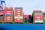 Shipping containers stacked on a cargo ship.