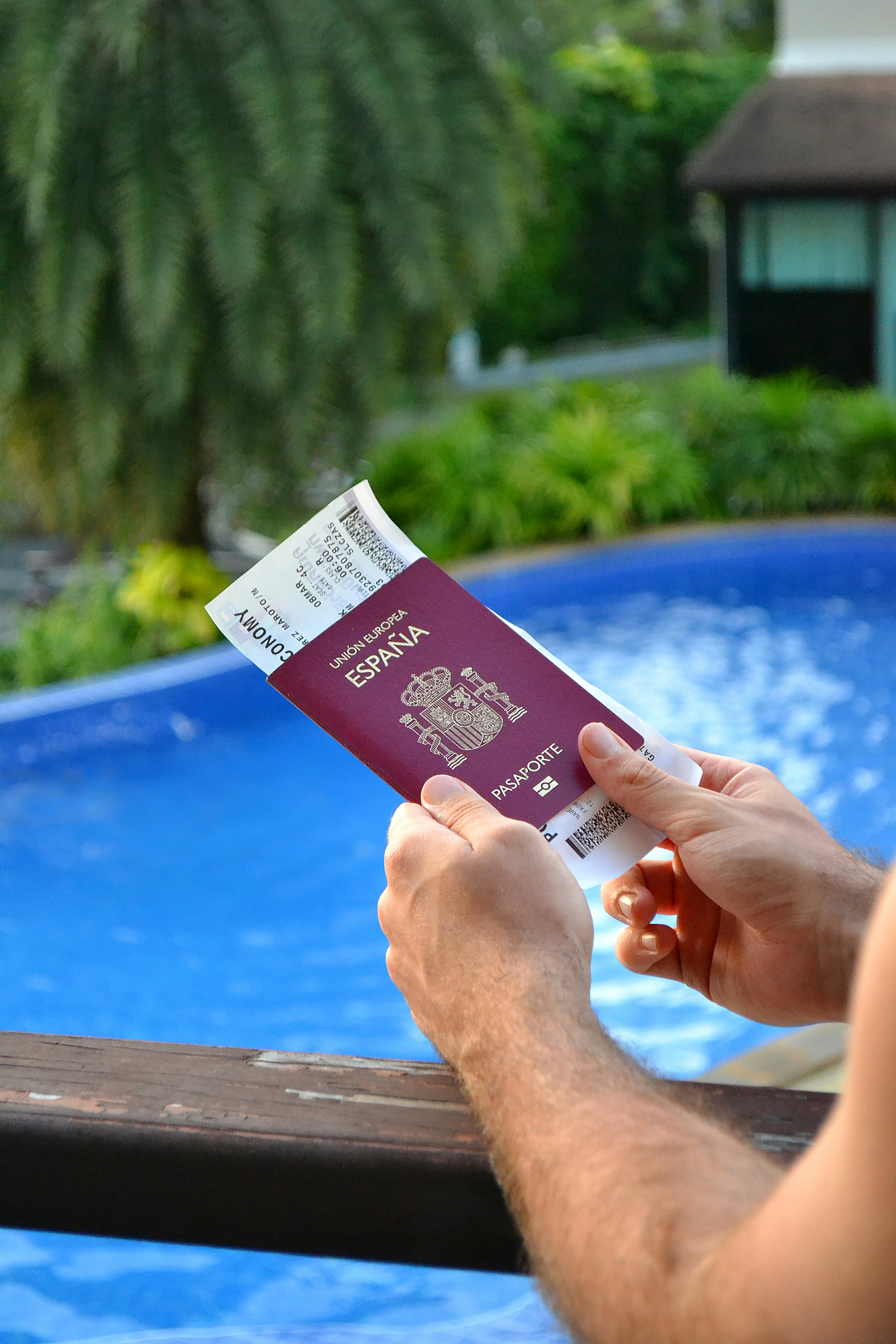 Checking a spanish passport and boarding pass.
