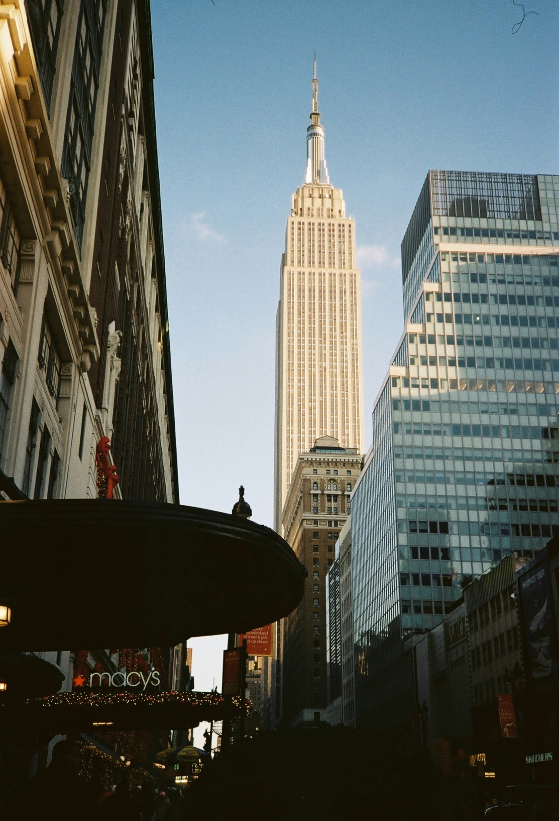 The empire state building towers above new york city.