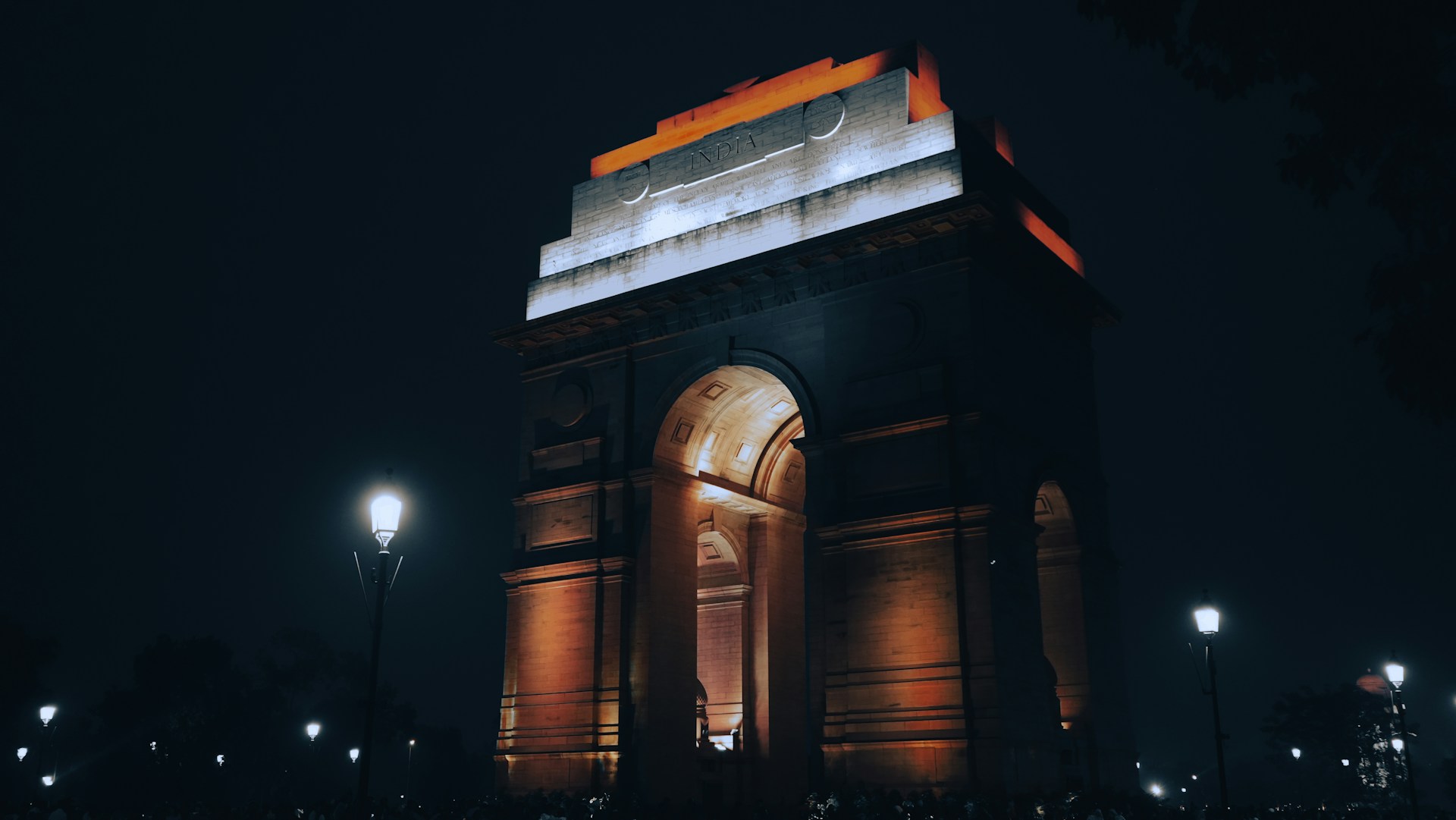 India gate is lit at night.