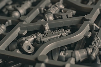 Plastic model kit sprue with various parts.