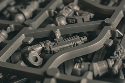 Plastic model kit sprue with various parts.