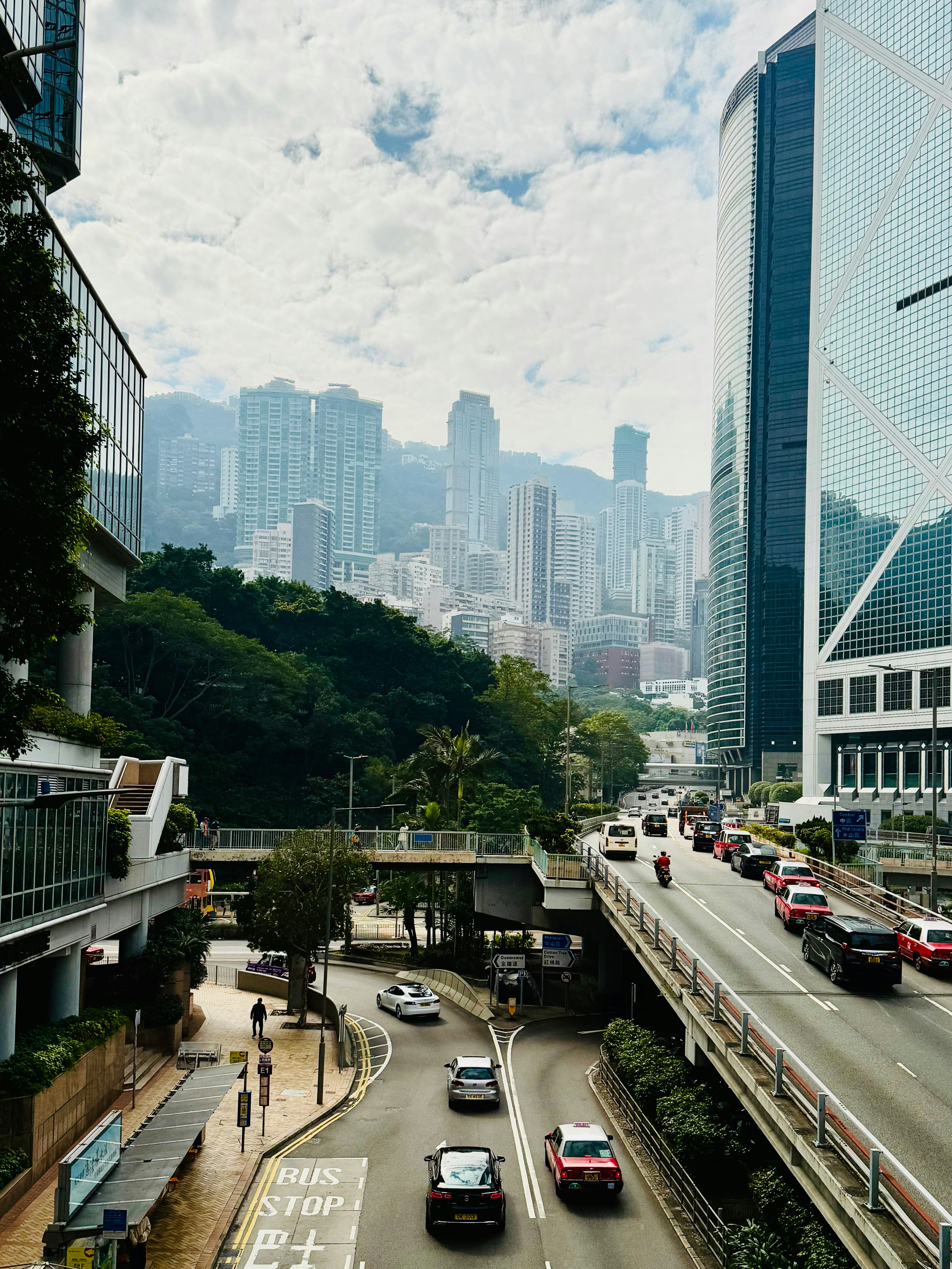 A cityscape view featuring skyscrapers and roads.