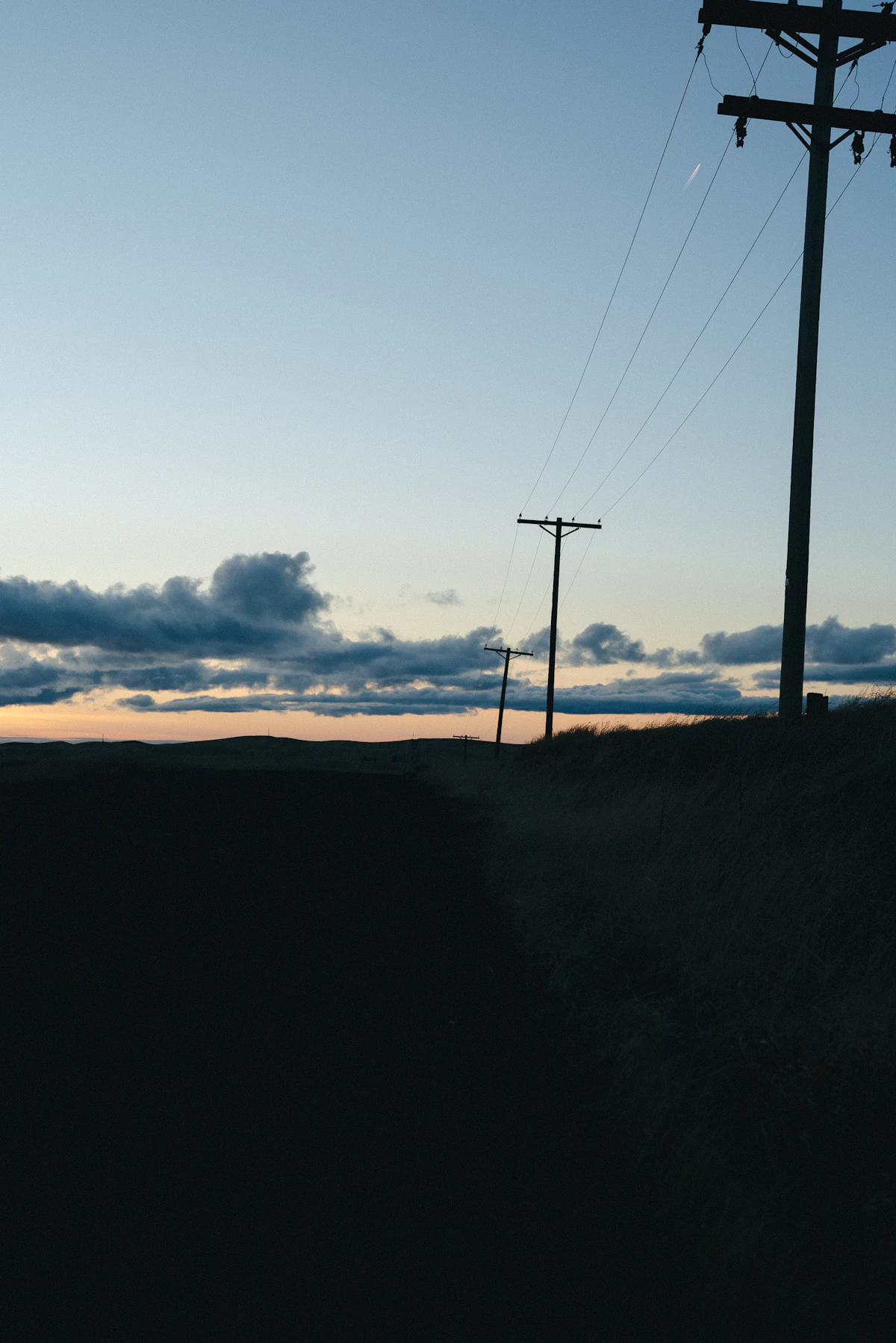Sunset over power lines and fields near Sioux Falls, SD