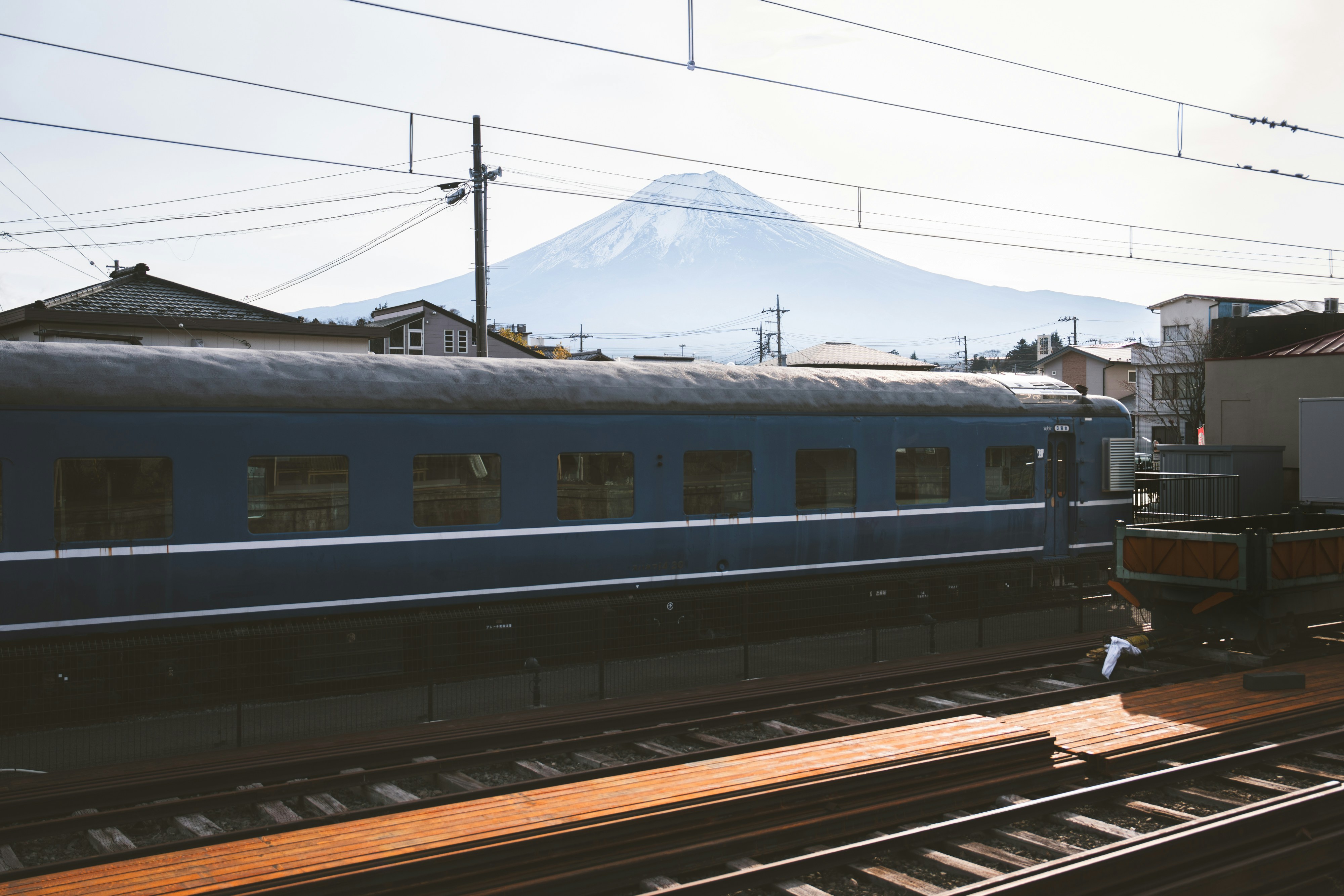 Train with mount fuji in the background.
