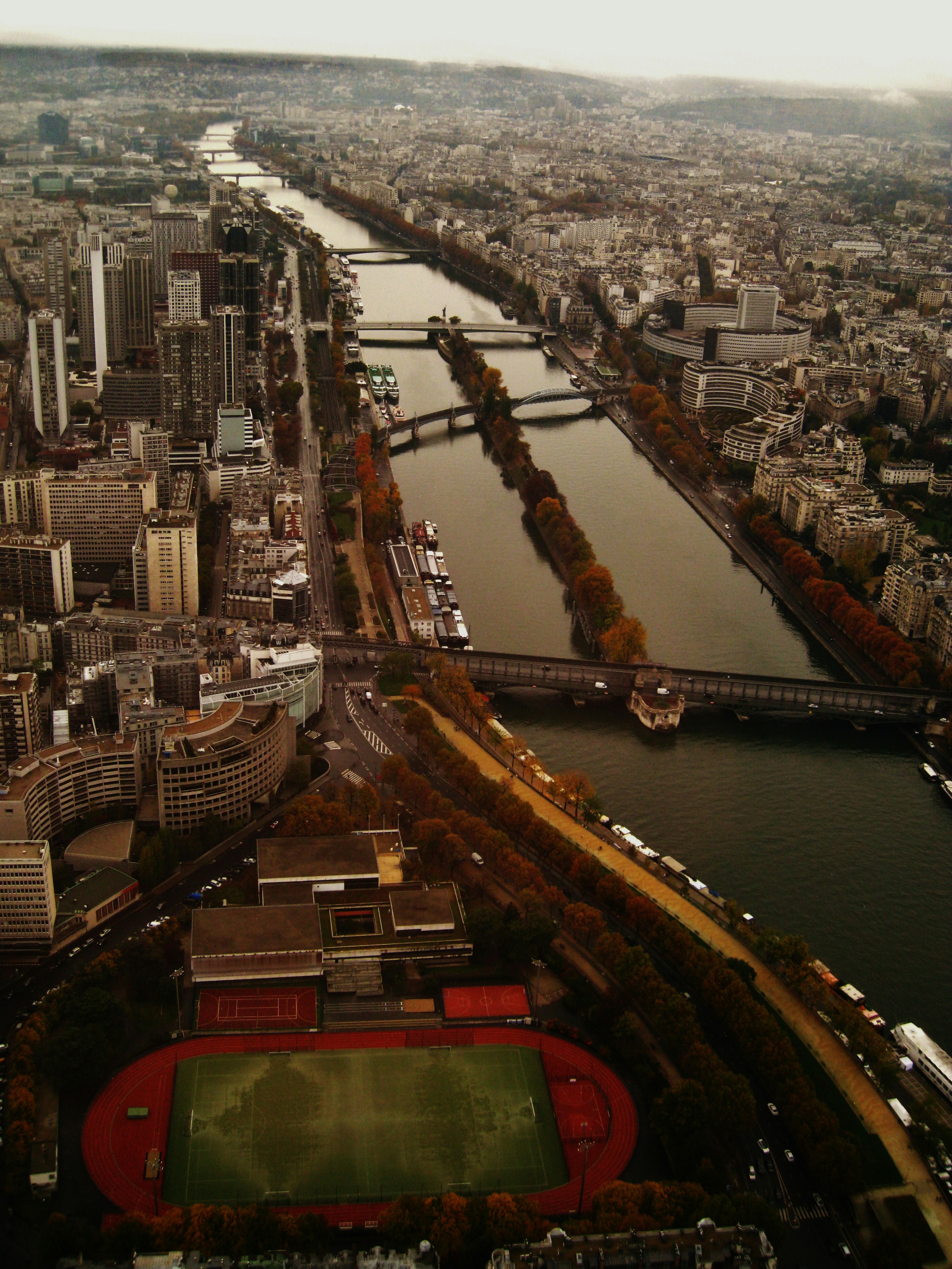 Aerial view of paris, showing the seine river.