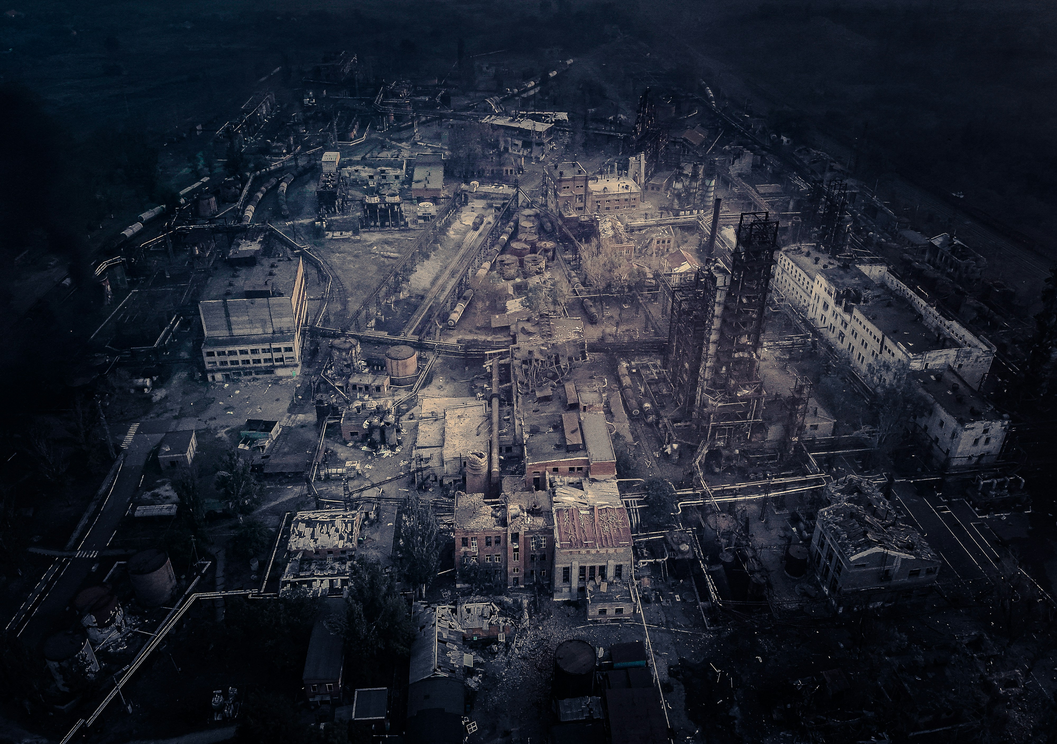 Destruction and ruins in a dark and somber landscape.