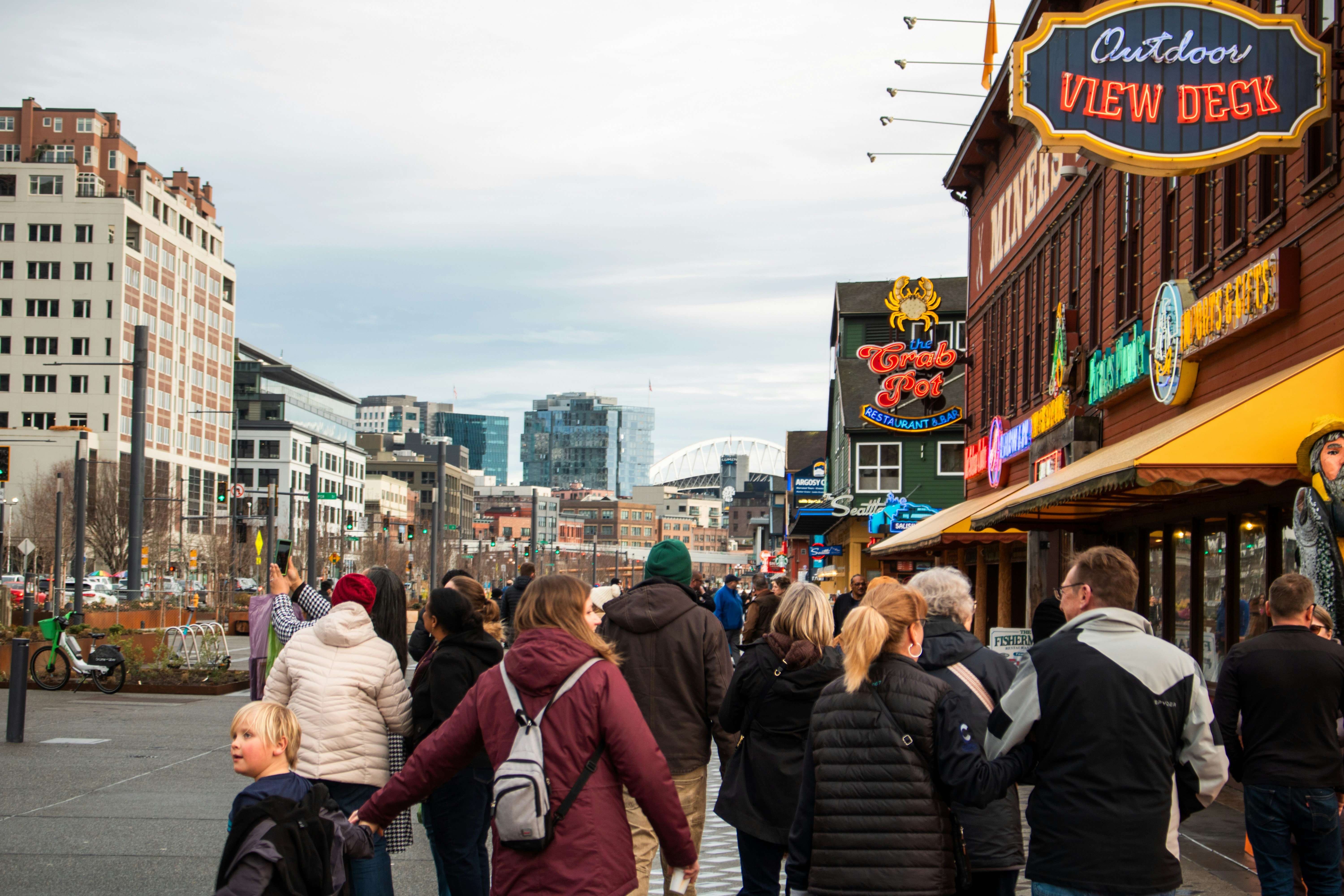 People are walking on a city street.