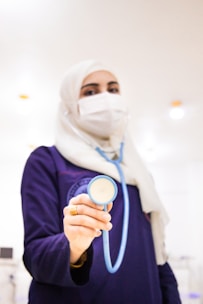 A healthcare professional with a stethoscope.