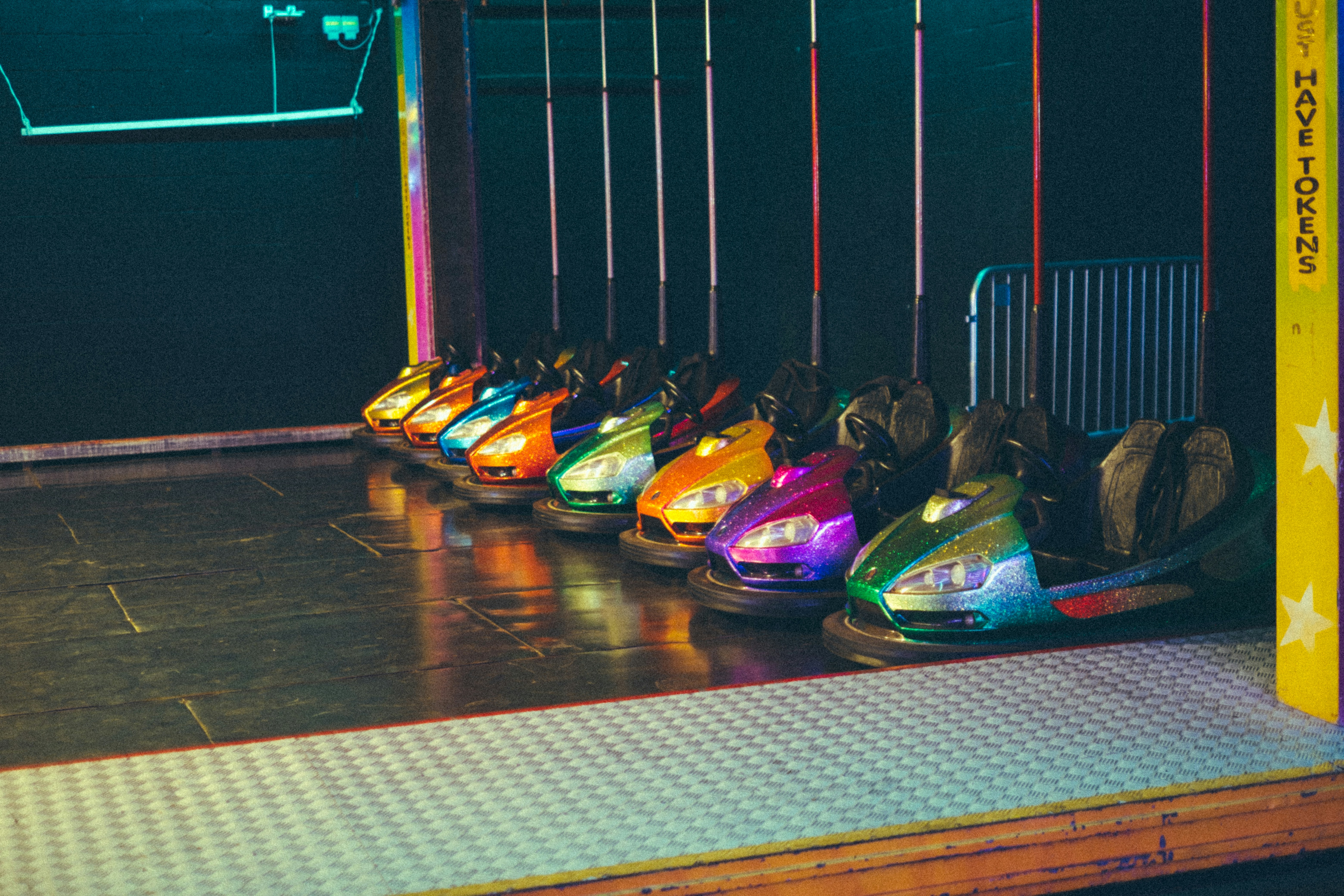 Colorful bumper cars are ready for a fun ride.