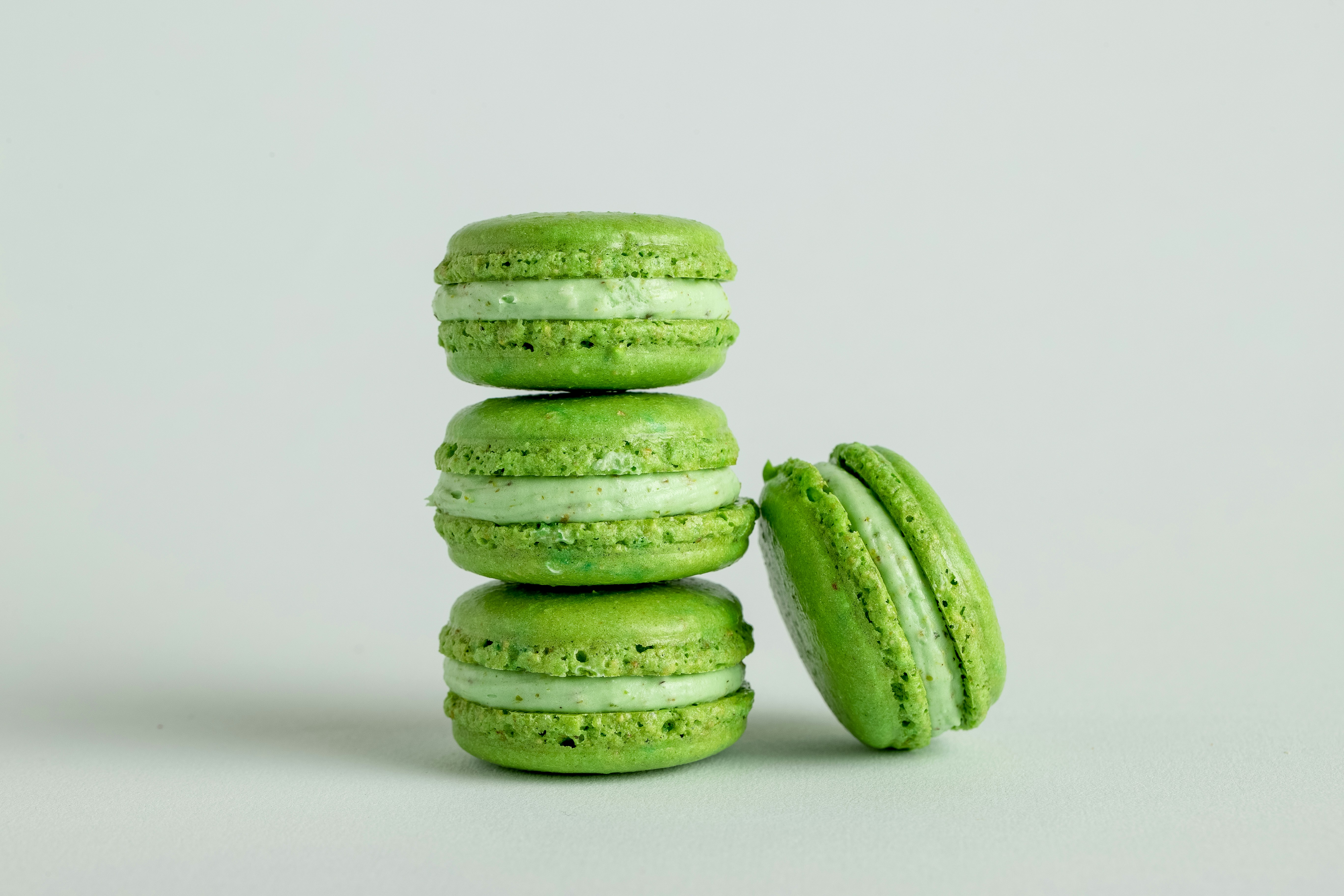 Three green macarons stacked up.