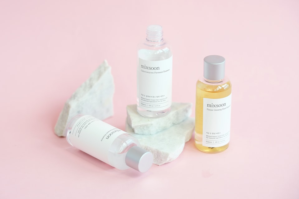 Skincare bottles on marble