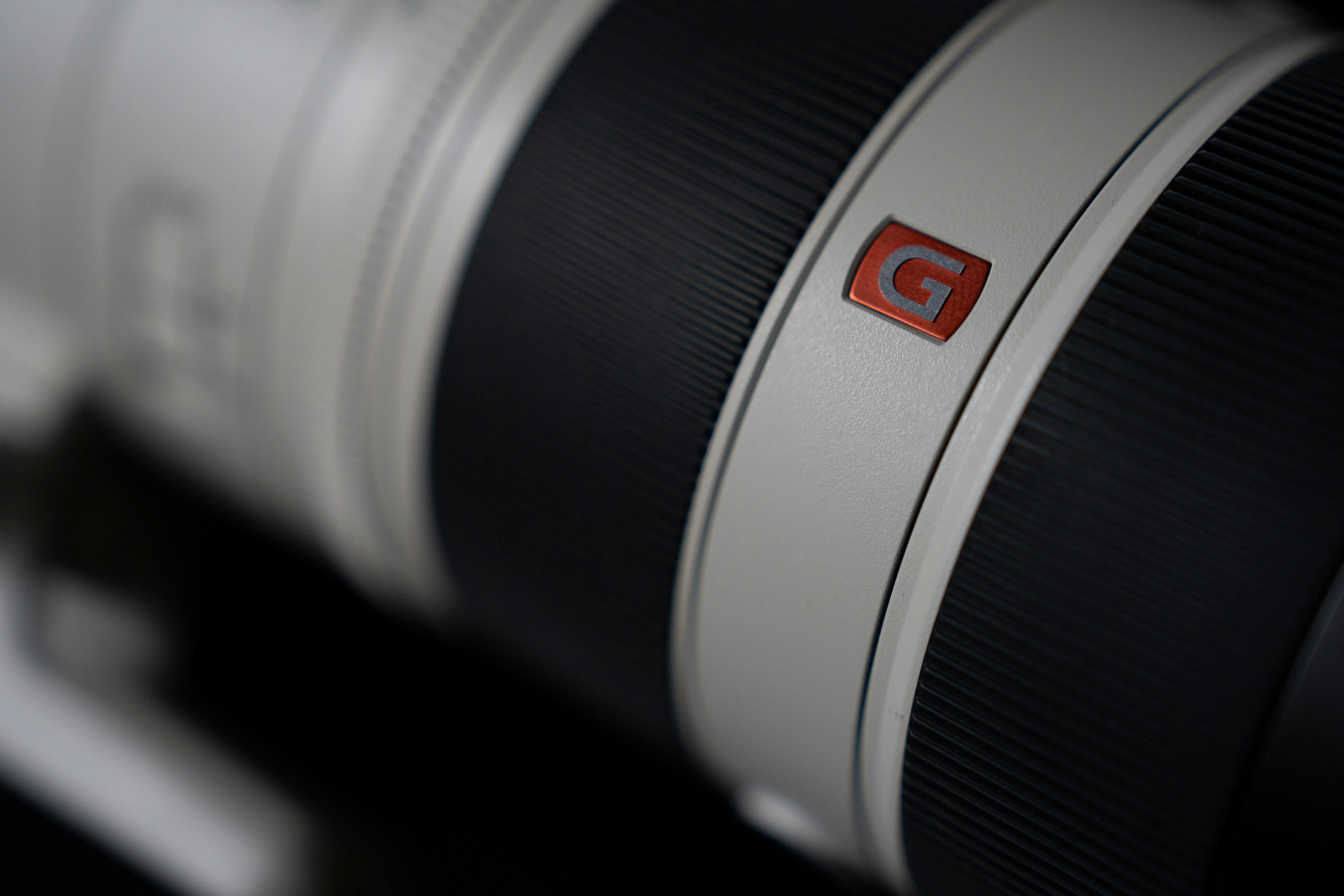 A sony camera lens with the "g" logo.