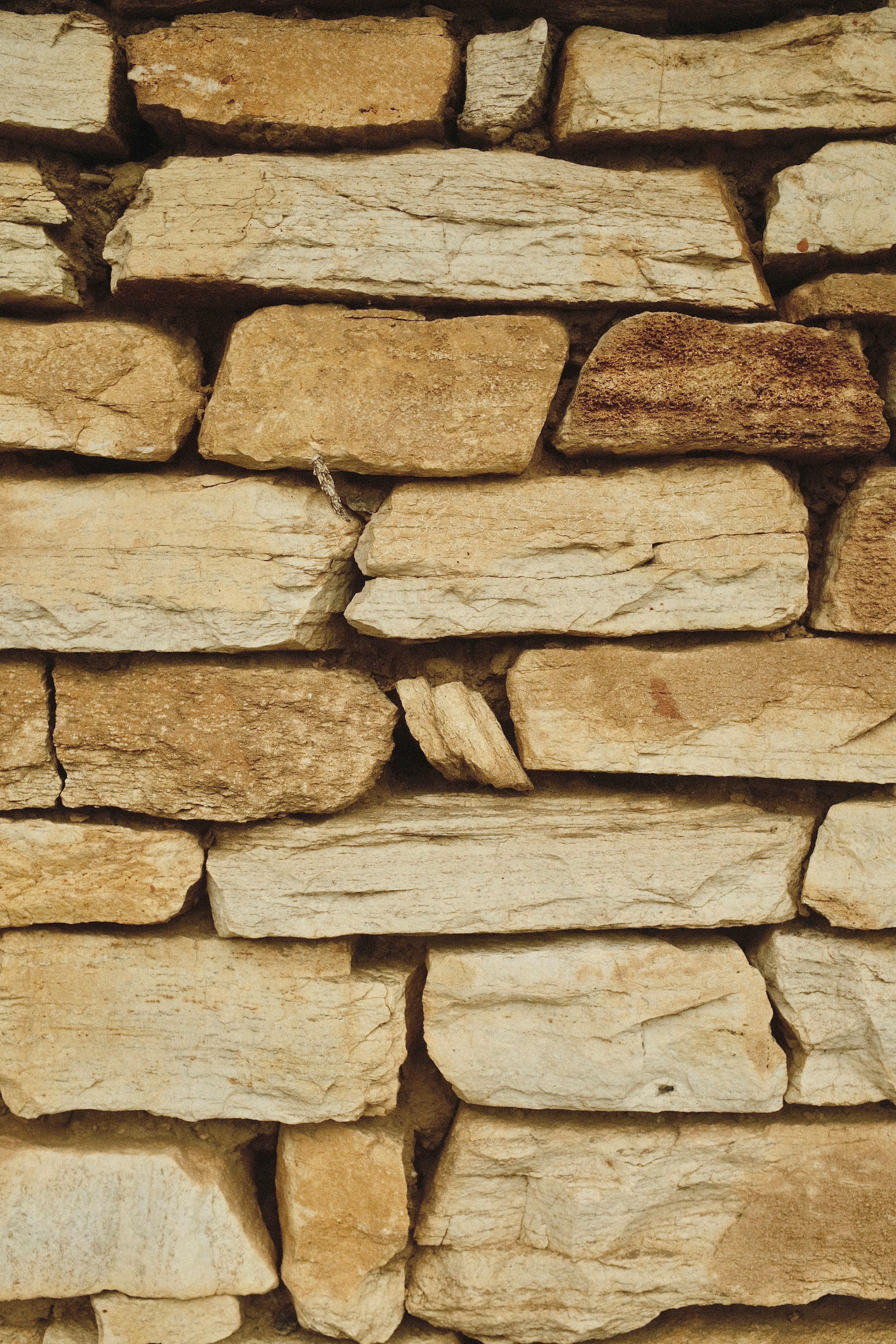 A close-up of a stone brick wall.
