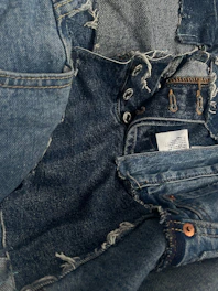 Close-up of patchwork denim clothing.