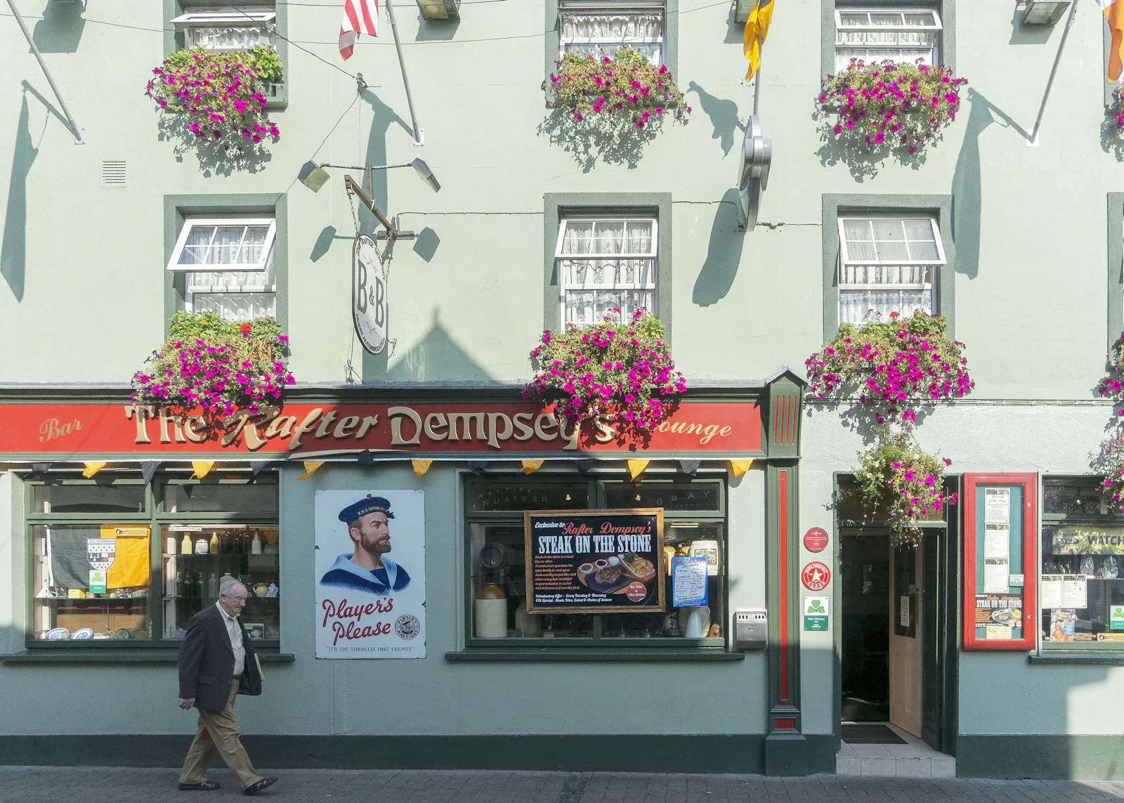Flower-covered Irish pub front in Kilkenny