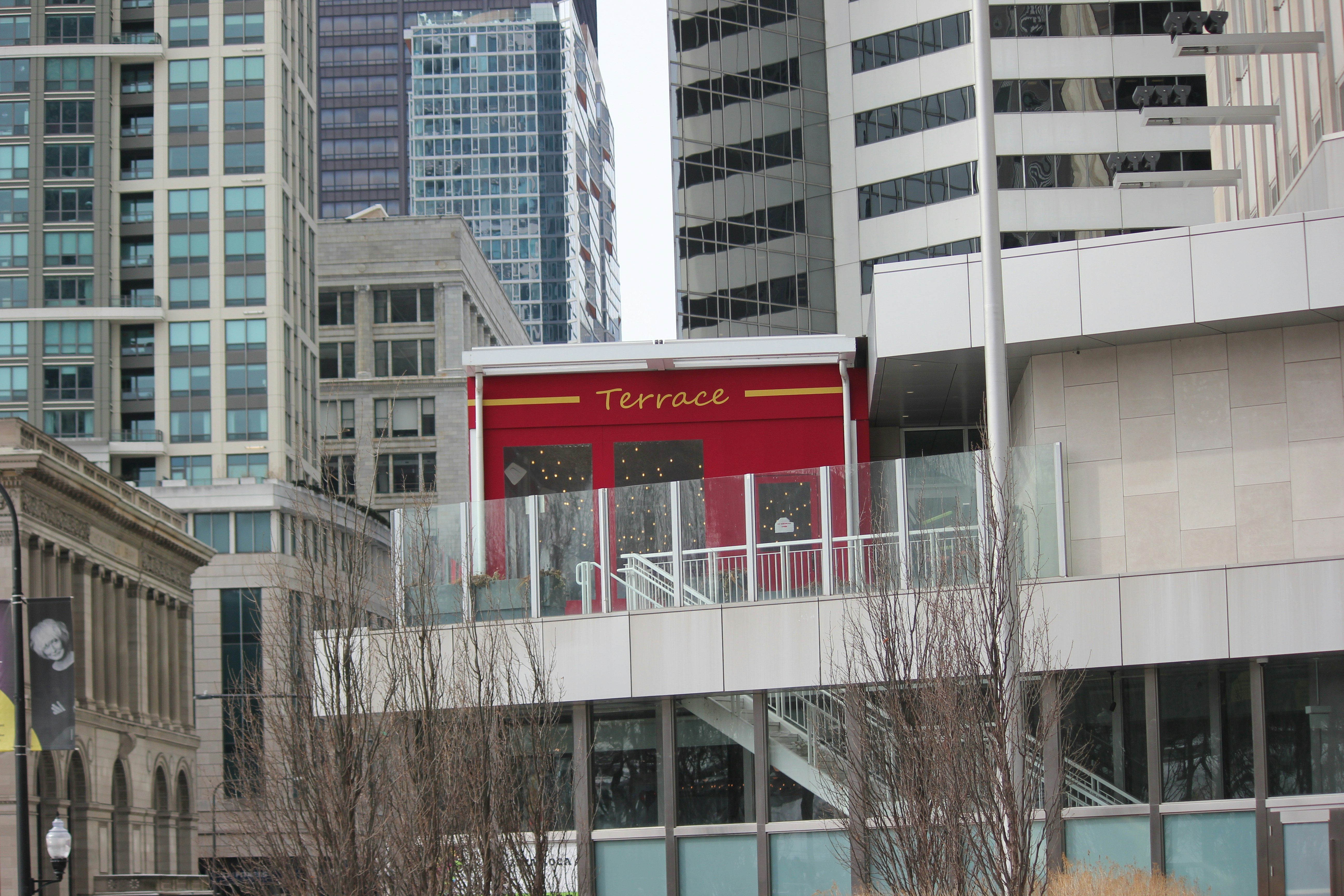 A red terrace restaurant overlooks a city. photo – Free City Image on ...