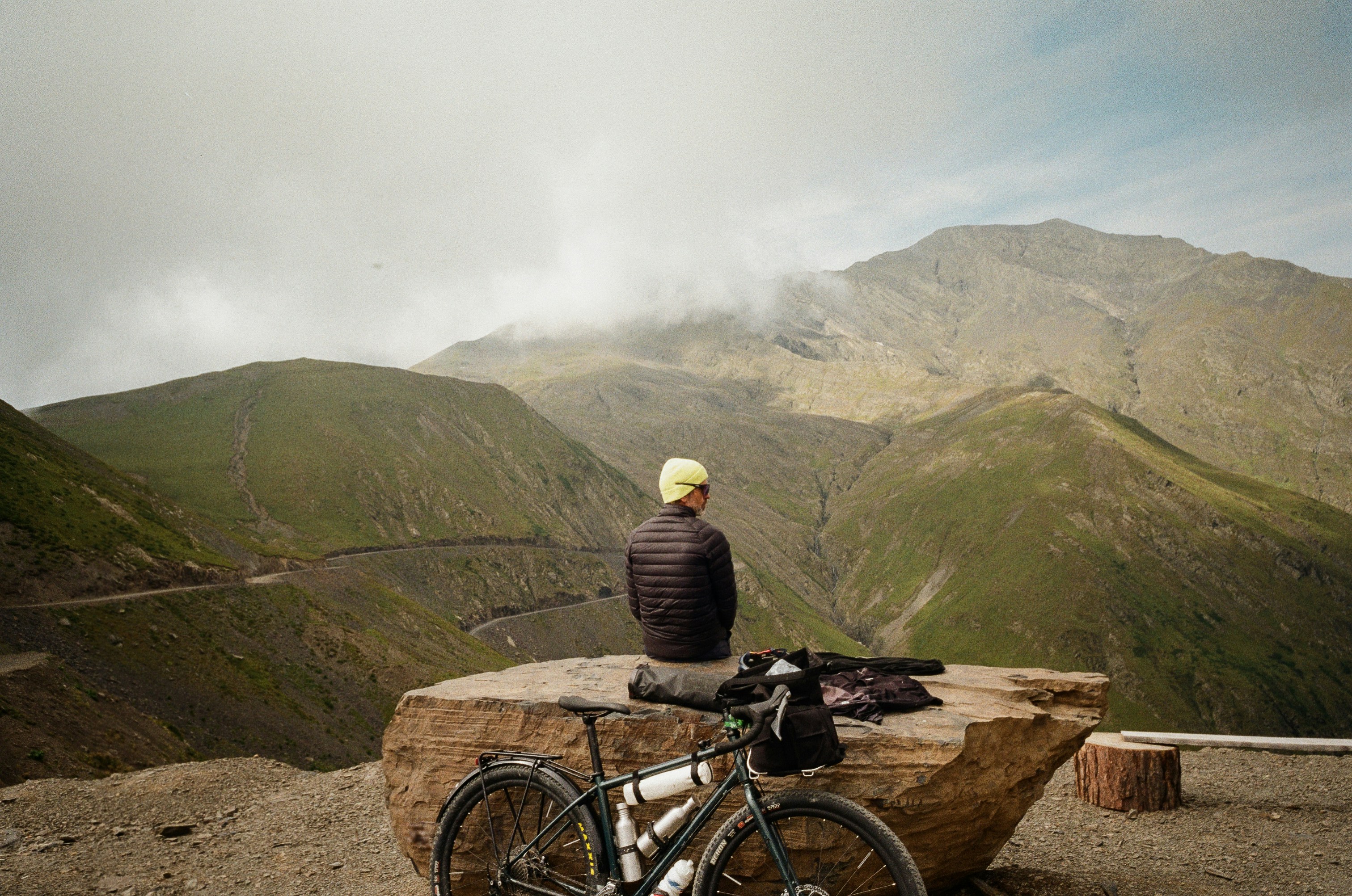 Cyclist enjoys view of the mountains.