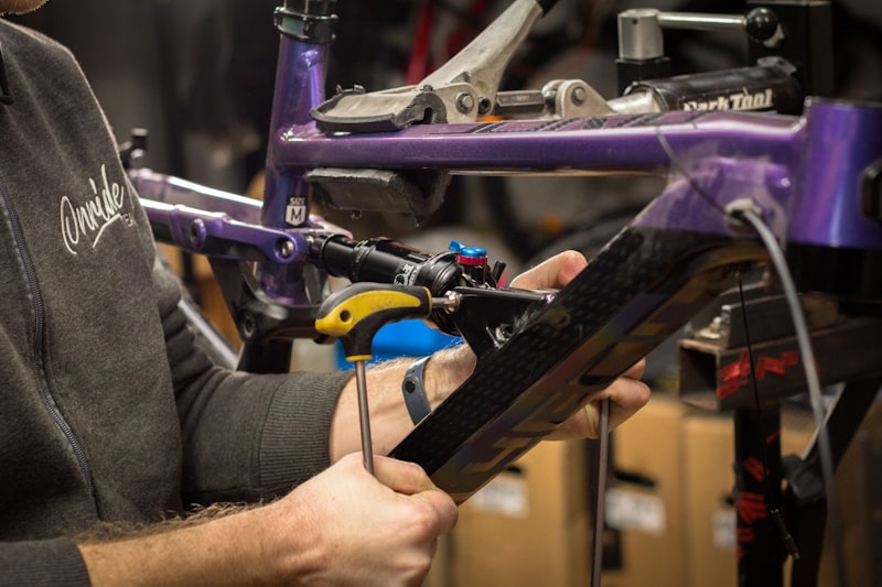 Bicycle repair happening in a workshop setting