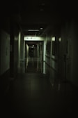 A dark, creepy hospital corridor.