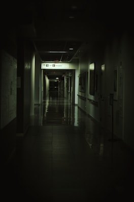 A dark, creepy hospital corridor.