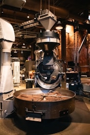 Coffee beans being roasted in a commercial roaster.