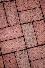 Brick walkway with a diagonal pattern.