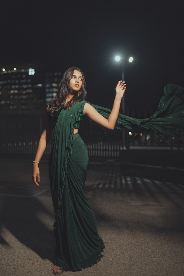 Forest green silk Paithani saree in motion