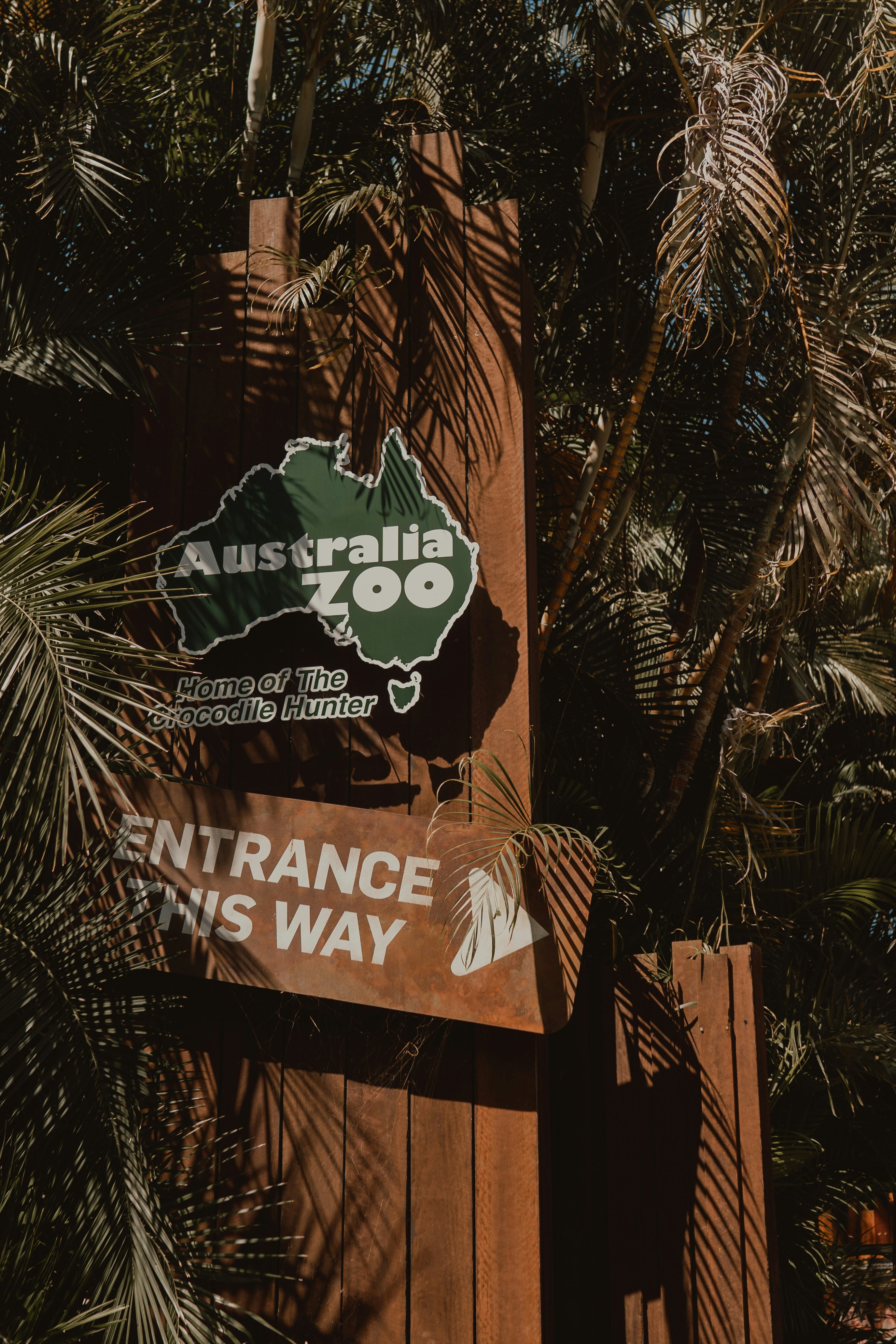 Australia zoo entrance sign points the way.