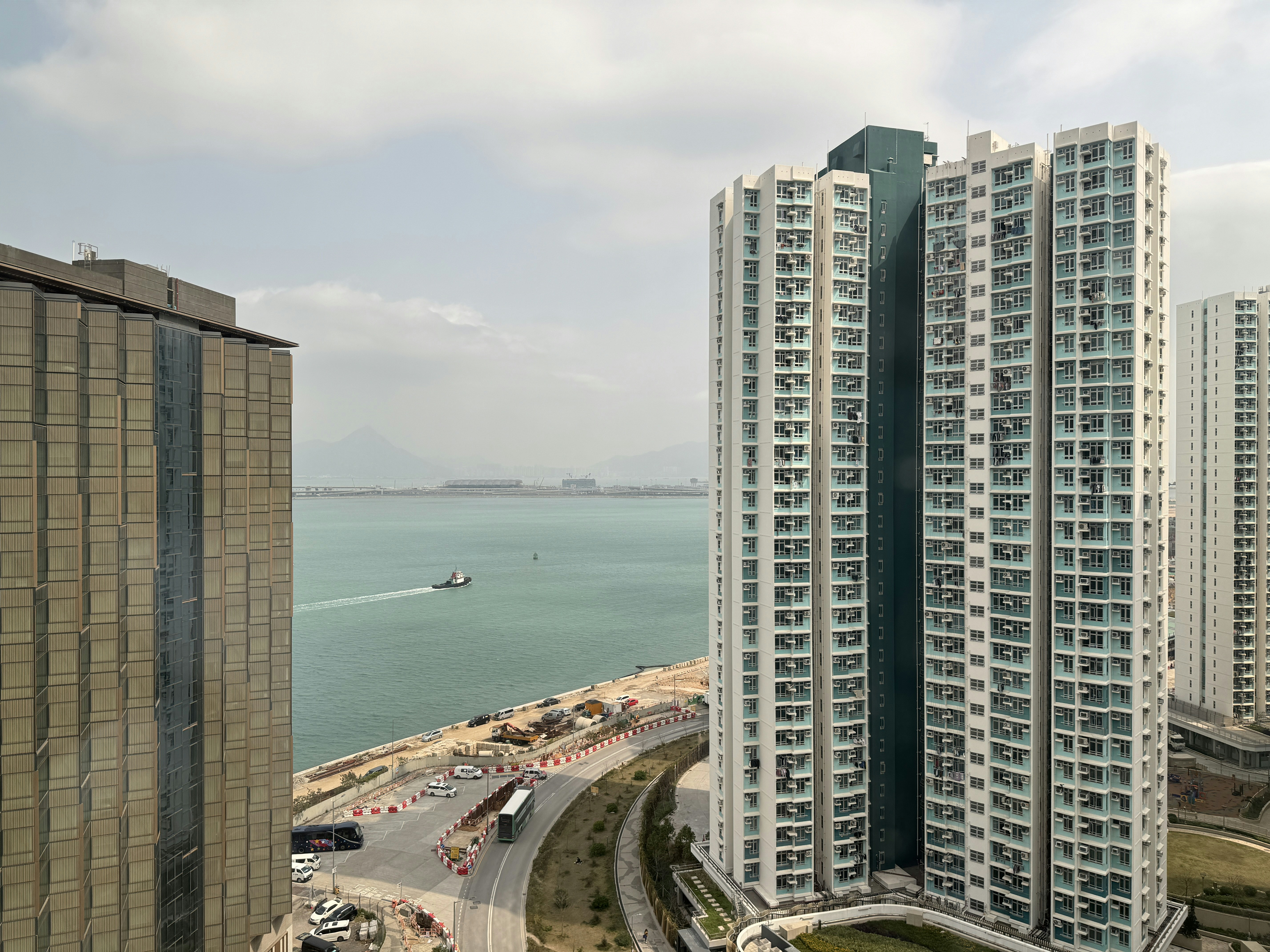High-rise buildings sit along the water's edge.