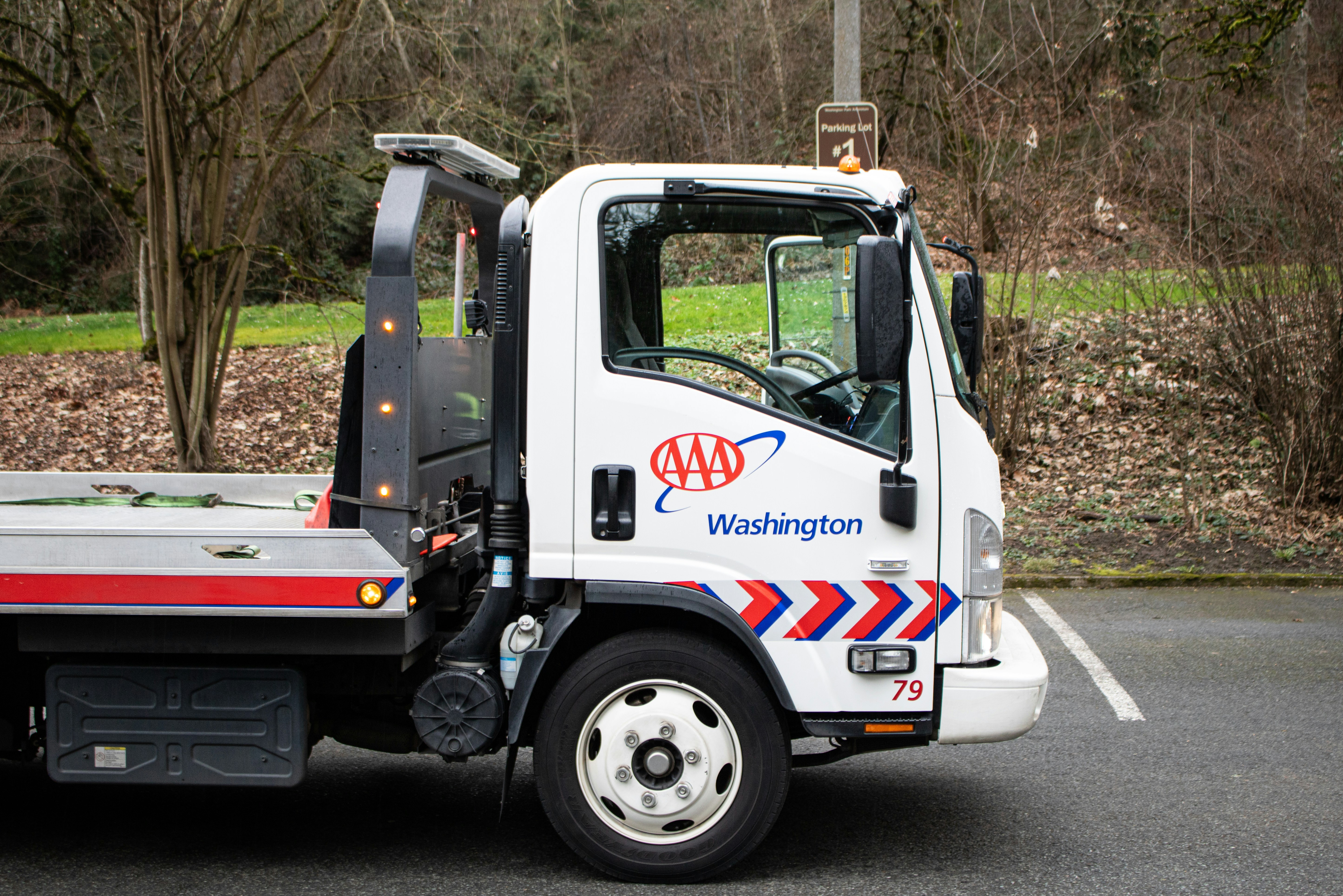 A white AAA tow truck.