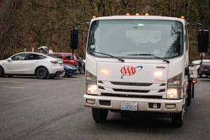 Aaa tow truck arrives at the scene.