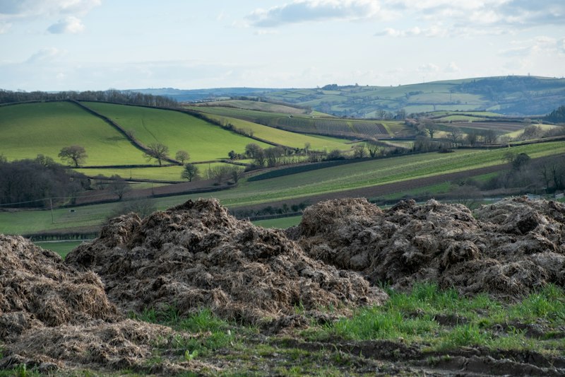 Farm composting operation converting waste to valuable organic matter