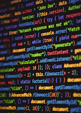 Programming code is shown in a colorful display.