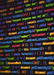 Programming code is shown in a colorful display.