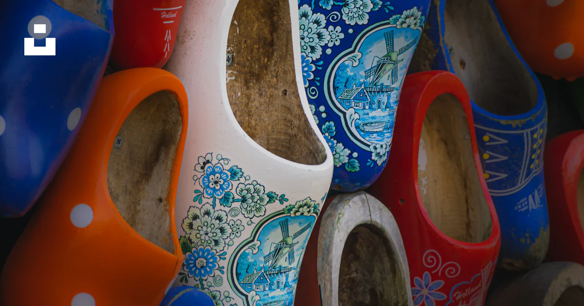 Colorful dutch clogs are artistically arranged together. photo – Free ...