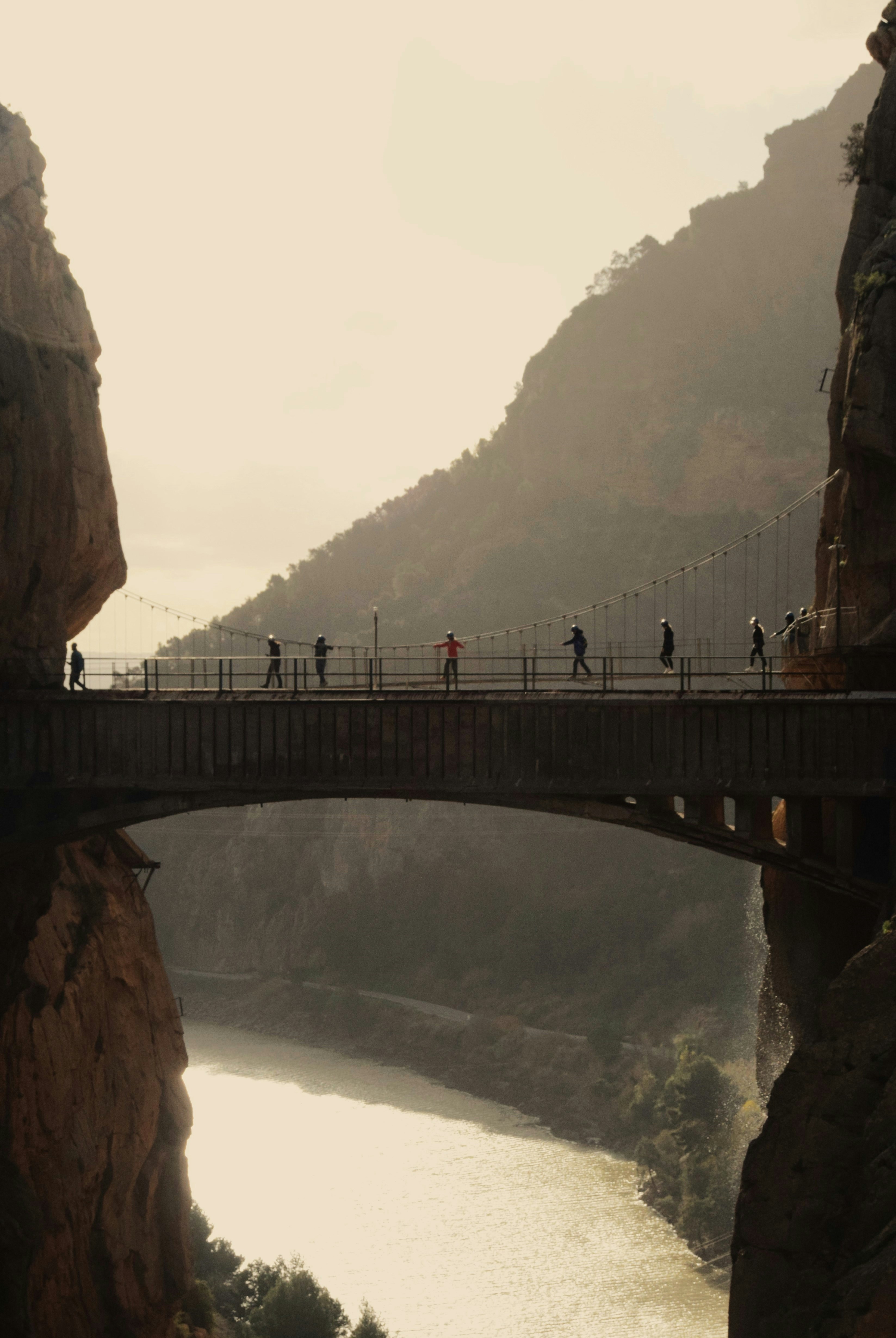 bridge over a lake and linking two big rocks. For the page Rock Climbing in Spain