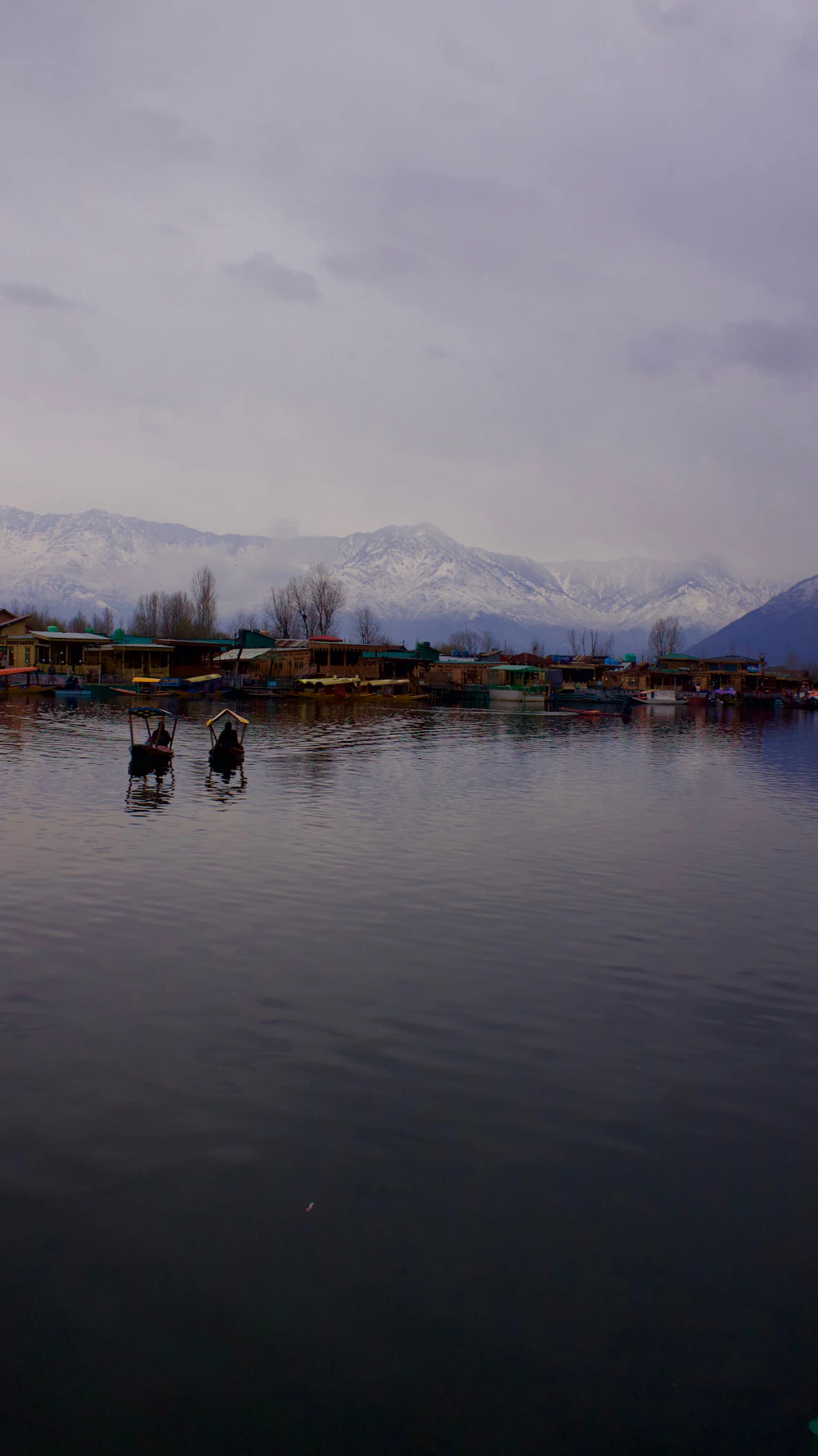 Dal Lake in Srinagar with boats and mountain scenery