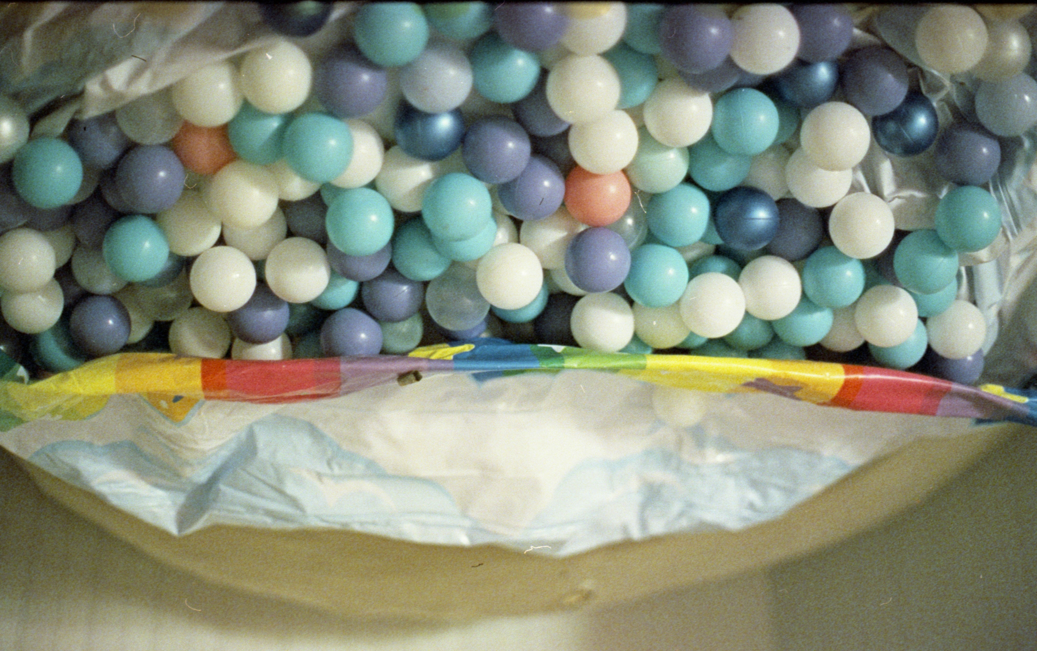 A ball pit filled with colorful plastic balls.